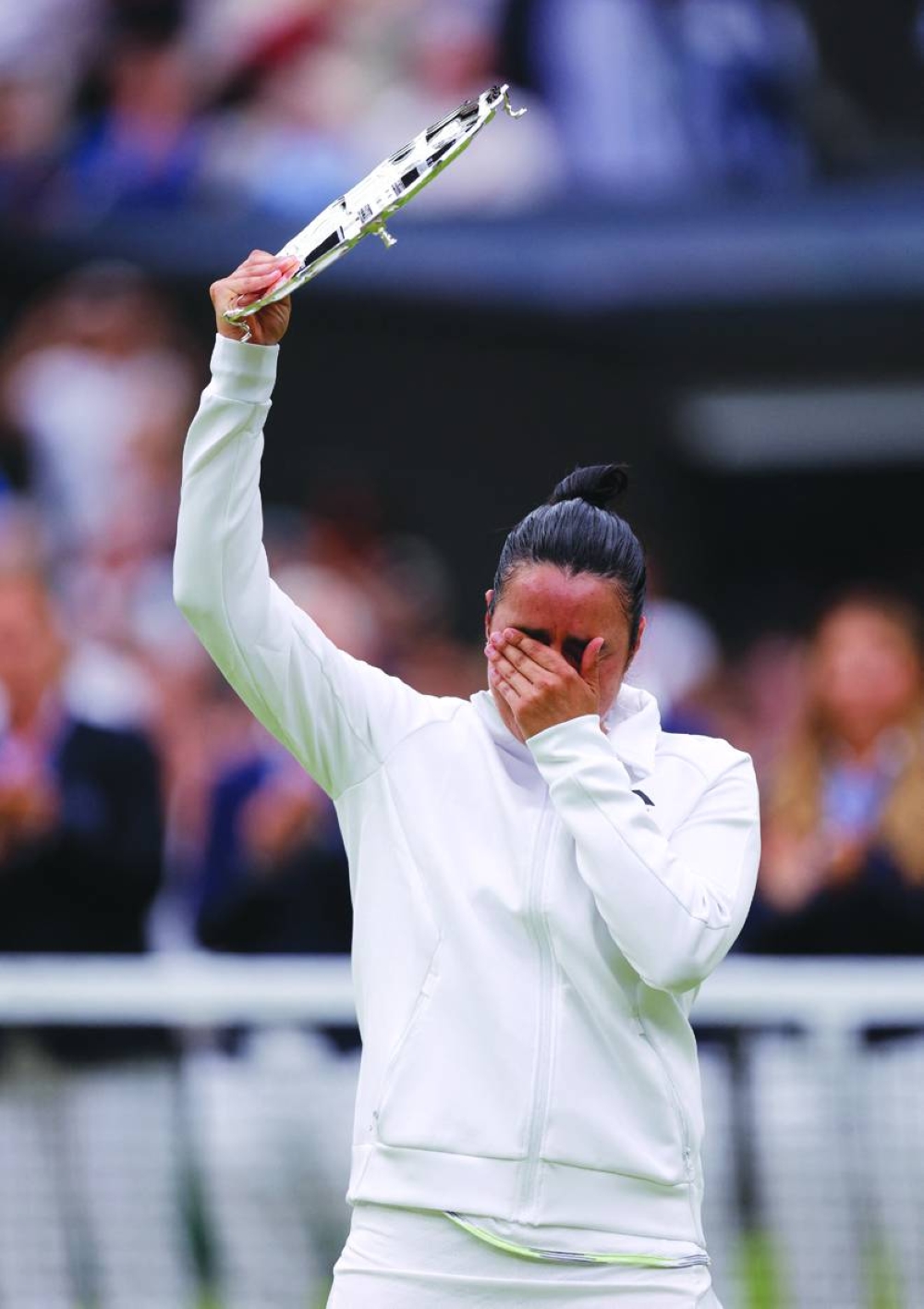 Tunisia’s Ons Jabeur with the runners up trophy on Saturday. (Reuters)