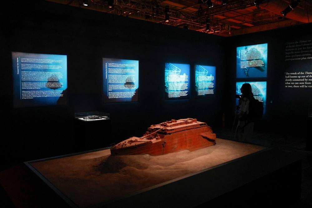 A visitor discovers on the opening day the XXL Titanic exhibition at Paris Expo Porte de Versailles in Paris. AFP