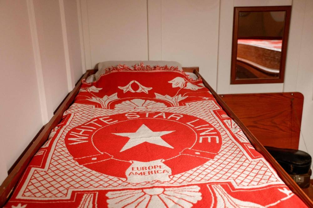 A photograph shows the replica of a second class room of the Titanic liner on the opening day of the XXL Titanic exhibition at Paris  Expo Porte de Versailles in Paris. AFP