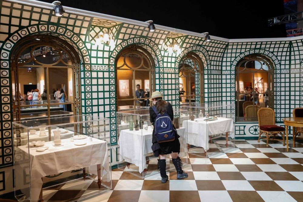 A visitor discovers on the opening day the XXL Titanic exhibition at Paris Expo Porte de Versailles in Paris. AFP