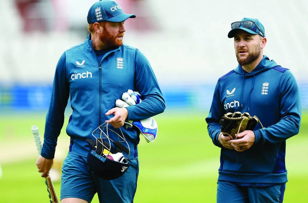 England’s Jonny Bairstow with head coach Brendon McCullum during practice ahead of the fourth Ashes Test at Old Trafford, Manchester, Britain, on Tuesday. (Reuters)