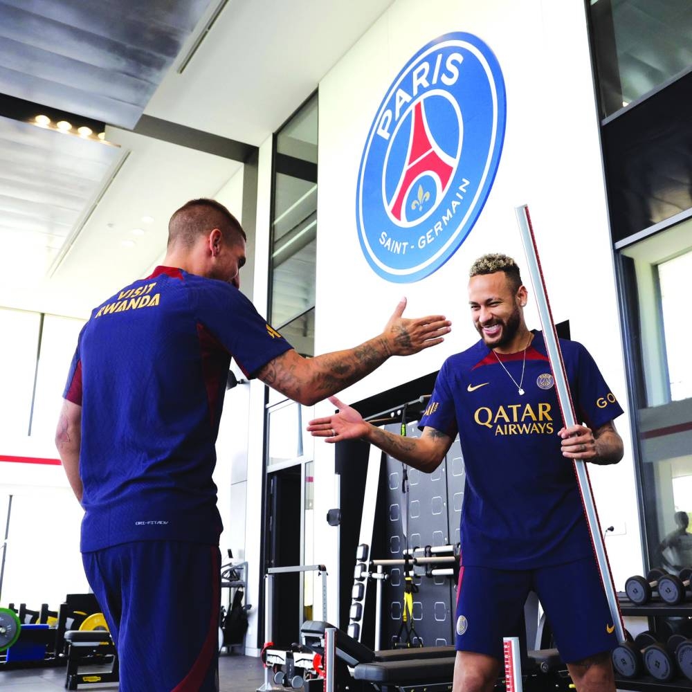 Brazilian striker Neymar (right) during a training session with Paris Saint-Germain teammate in Paris on Tuesday.