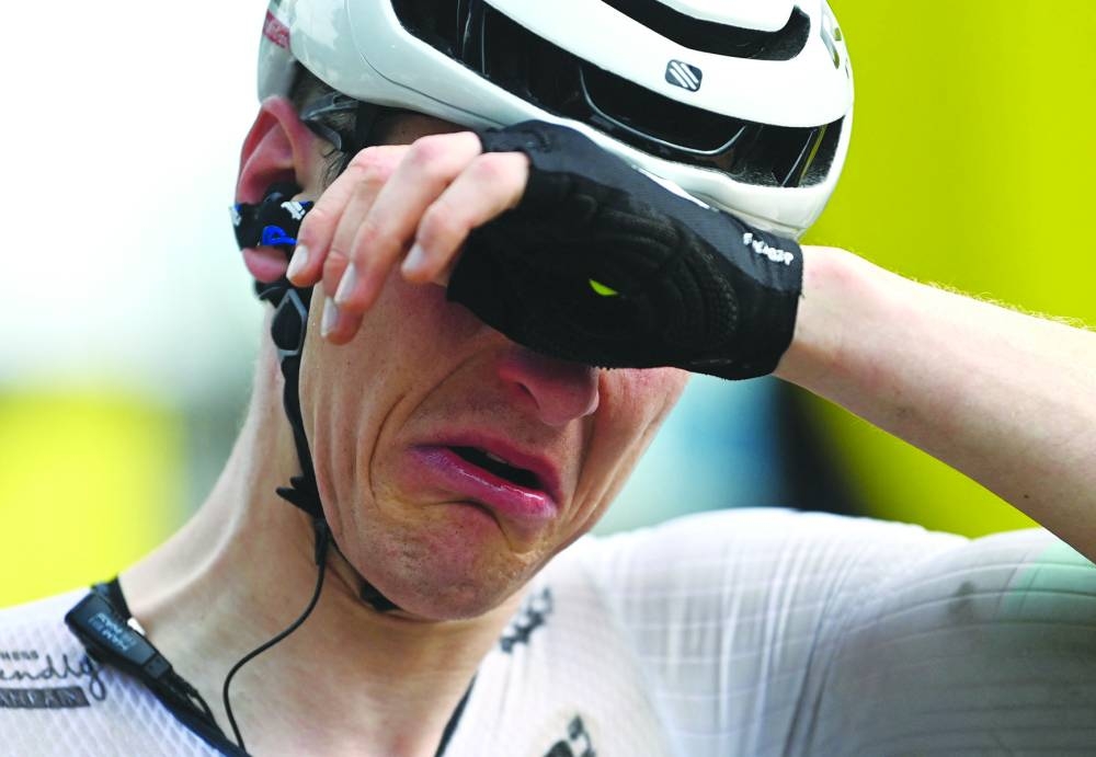 
Team Bahrain Victorious’ Matej Mohoric reacts after winning stage 19. (Reuters) 