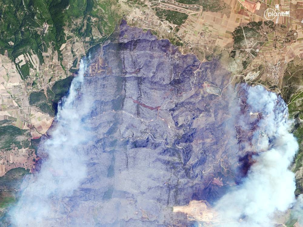
A satellite image shows wildfire in Attiki, Athens, Greece. 