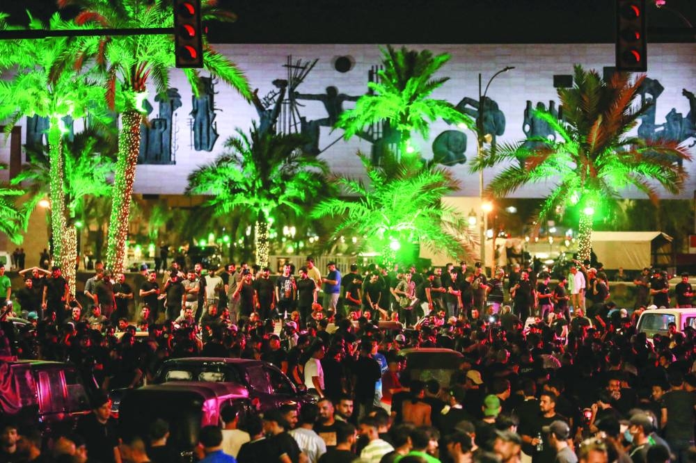 Followers of Iraqi cleric Moqtada al-Sadr protest near Baghdad's Green Zone Saturday.