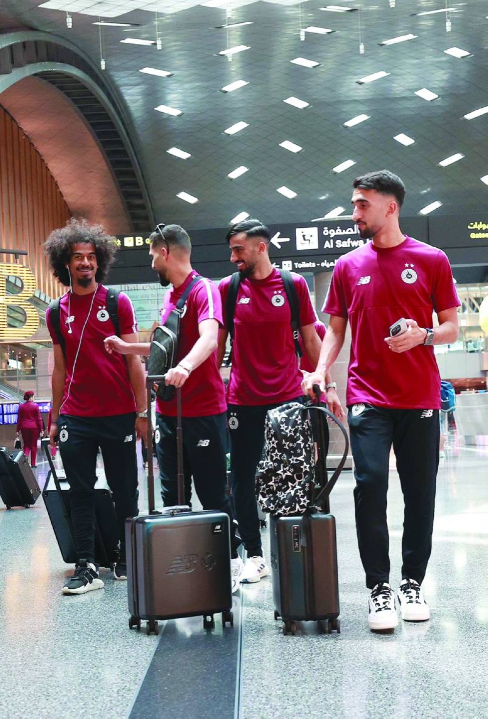 Al Sadd players at Hamad International Airport on Wednesday, before their departure to Abha, Saudi Arabia, for King Salman Club Championship.