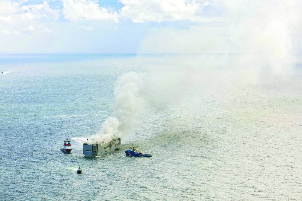  Emergency boats extinguishing the fire. (AFP)