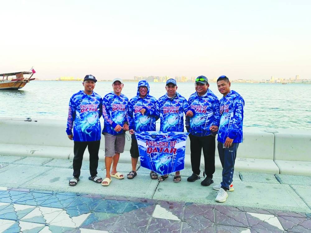 Joseph “Jeff” Cerezo and Adrian “Migs” Alfaras join the other members of the Facebook group 'Anglers of Qatar' before casting along the Doha Corniche.