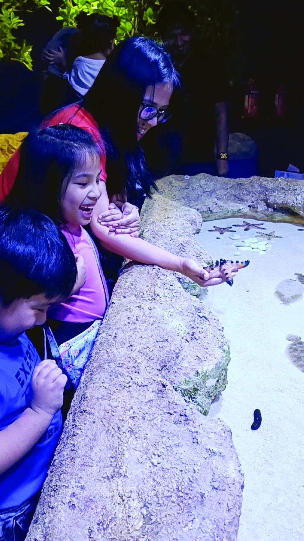 Engada Jr's family at the Touch Tank.