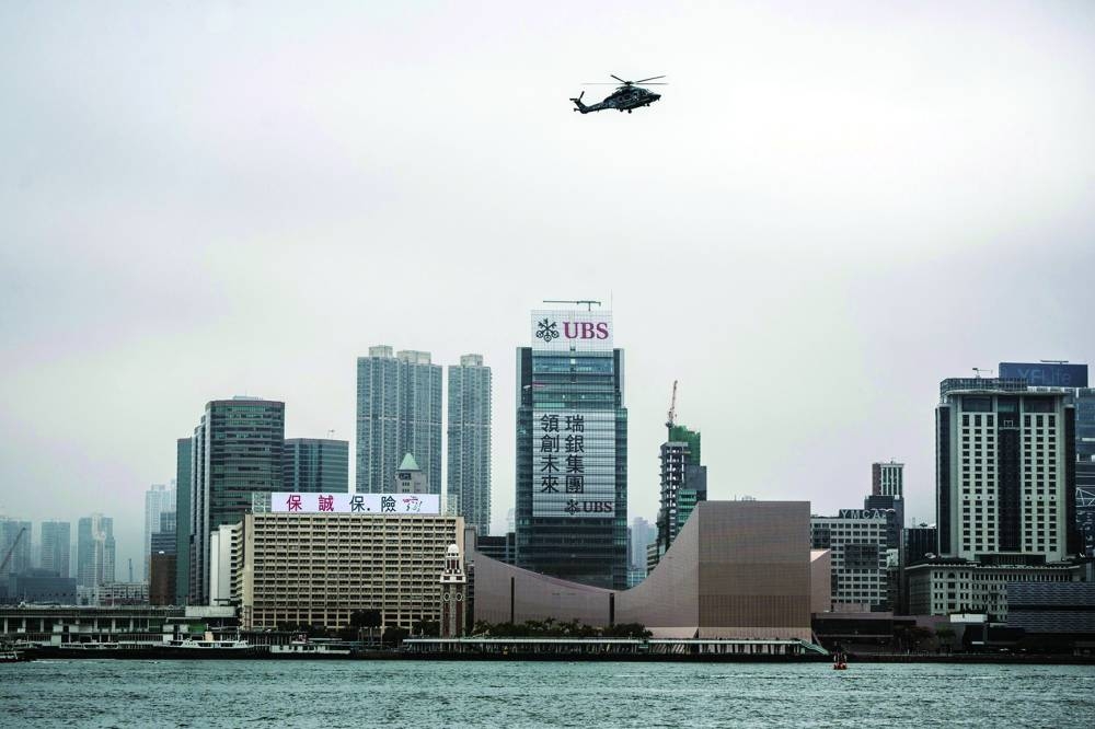 
Signage for UBS Group is seen at an office building in Hong Kong. UBS is planning to exit billions of dollars in loans to Credit Suisse’s clients in the Asia Pacific region, as the Swiss bank works to neutralise risks to its profitability and reputation from the defunct lender. 