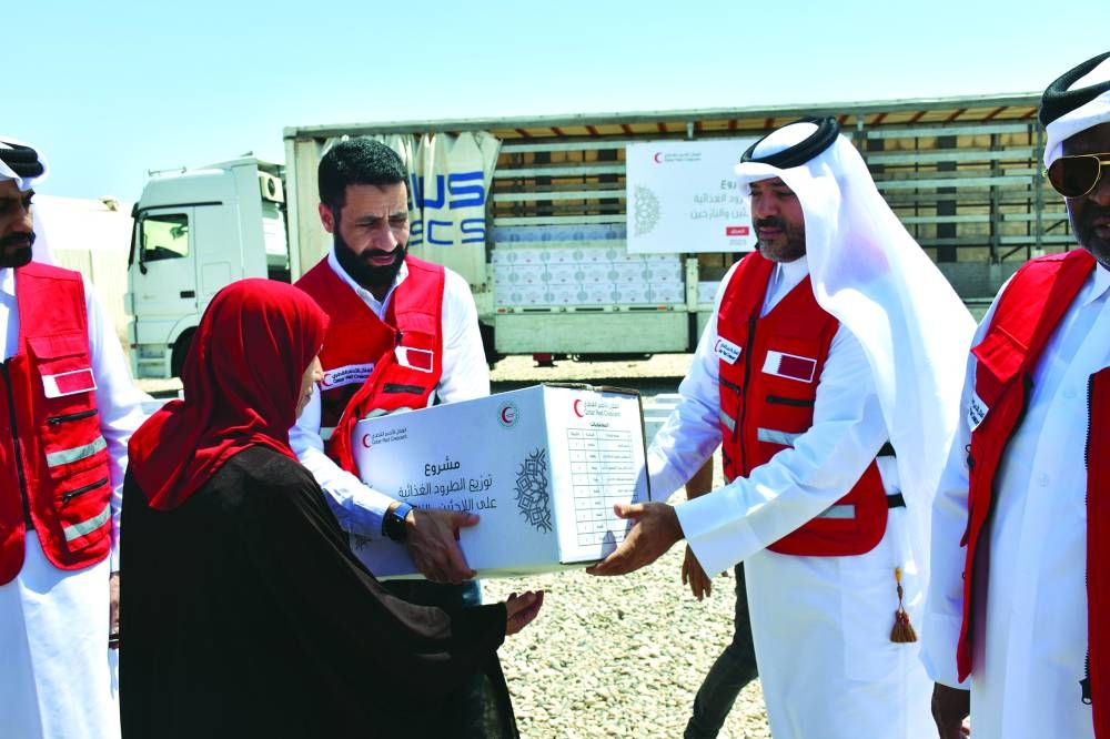 QRCS distributed 750 food parcels to displaced Iraqis