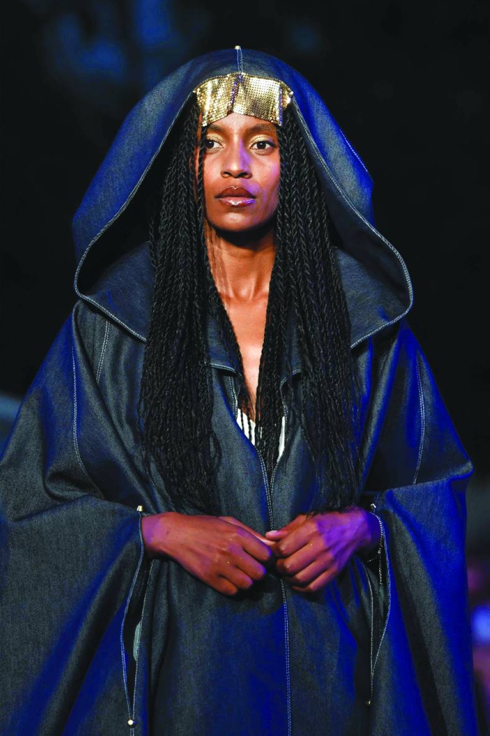 
A model presents a creation by French fashion designer Maud Beneteau during a fashion show at the Carthage Museum at the launch of the haute couture brand ‘Outa’. 