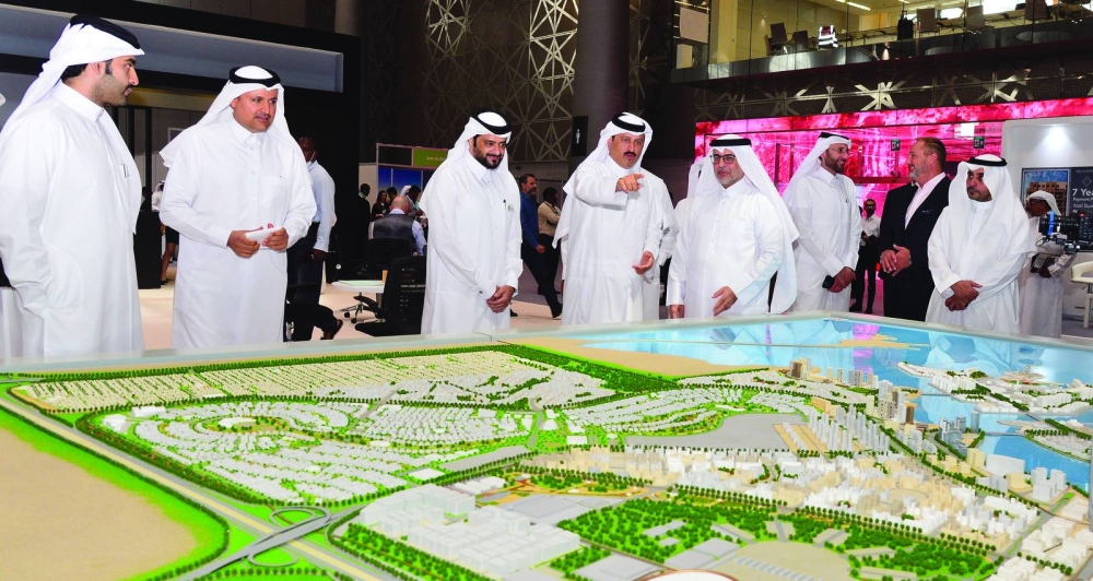 Officials view one of the projects featured at the last event.