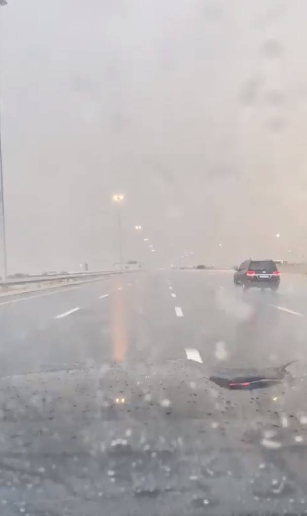 A screenshot from a video of the rain in Abu Samra Friday.