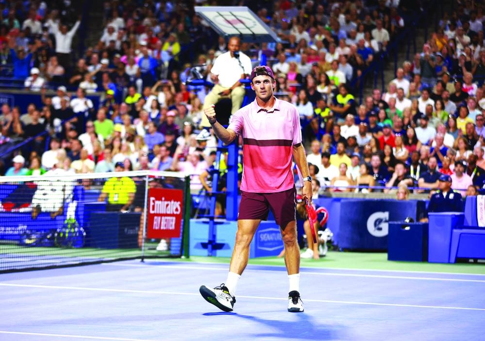 
Tommy Paul of the United States reacts after winning his match against Carlos Alcaraz (right) of Spain during Day Five of the Canadian Open at Sobeys Stadium in Toronto. (AFP) 