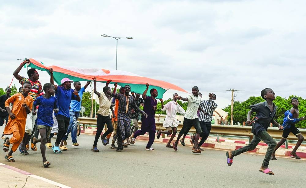 Supporters of Niger's National Council for the Safeguard of the Homeland (CNSP) gather for a demonstration in Niamey. (AFP)