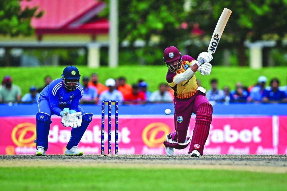 Brandon King of West Indies hits a shot during the fifth and final T20I match against India at the Central Broward Regional Park in Lauderhill, Florida, on Sunday. (AFP)