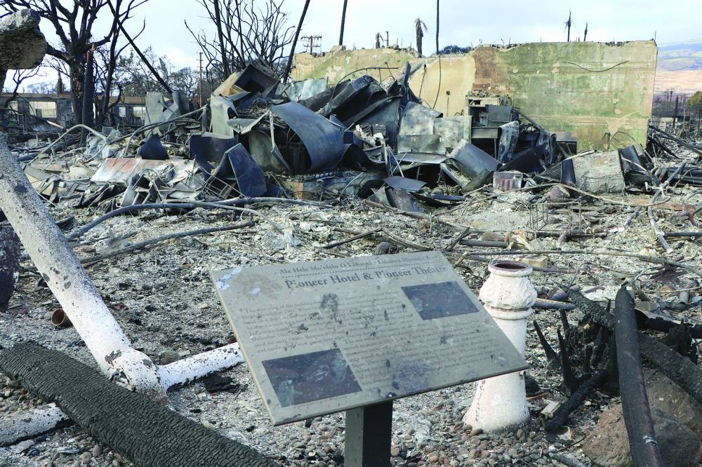 
A sign at the site of the destroyed Pioneer Hotel and Pioneer Theatre in Lahaina. 
