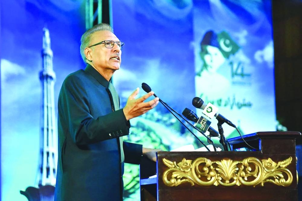 
President Arif Alvi speaks during a flag hoisting ceremony in Islamabad. (AFP) 