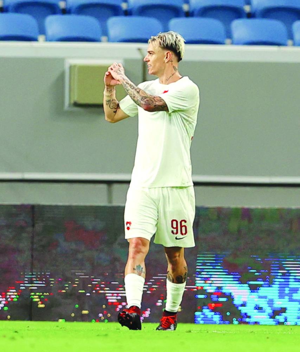 Al Rayyan’s Roger Guedes celebrates after scoring against Al Markhiya during the Expo Stars League match opener at the Al Janoub Stadium on Thursday.