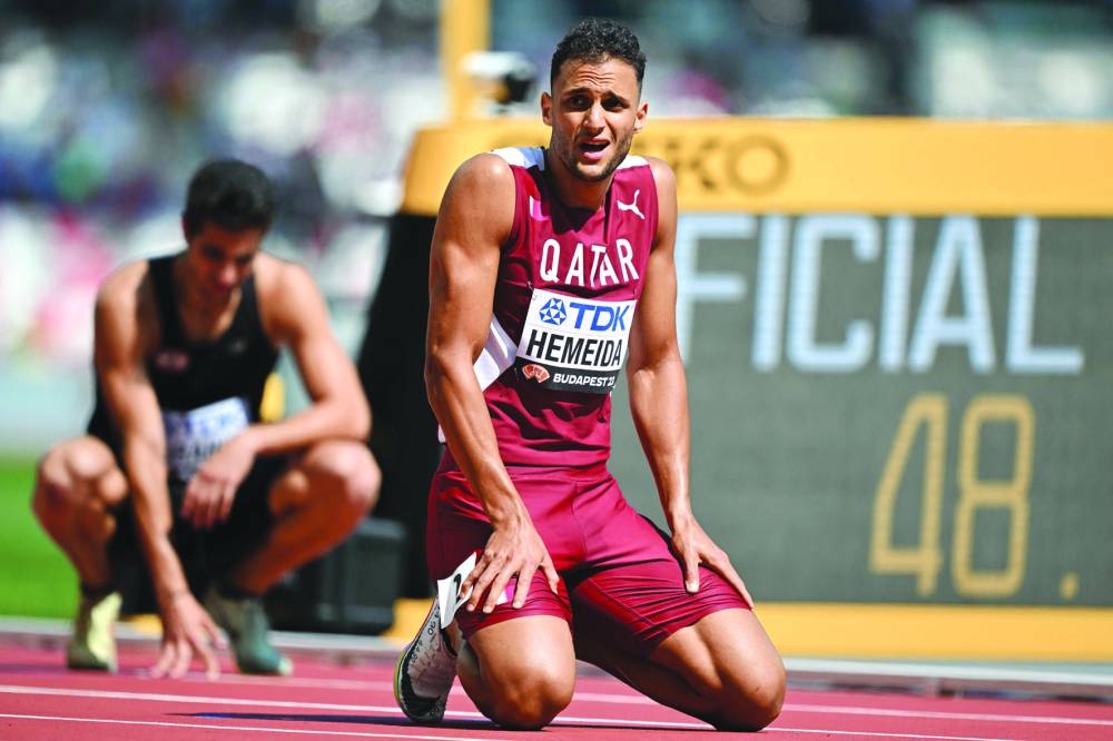 Qatar’s Bassem Hemeida reacts after the men’s 400m hurdles heats on Sunday. AFP