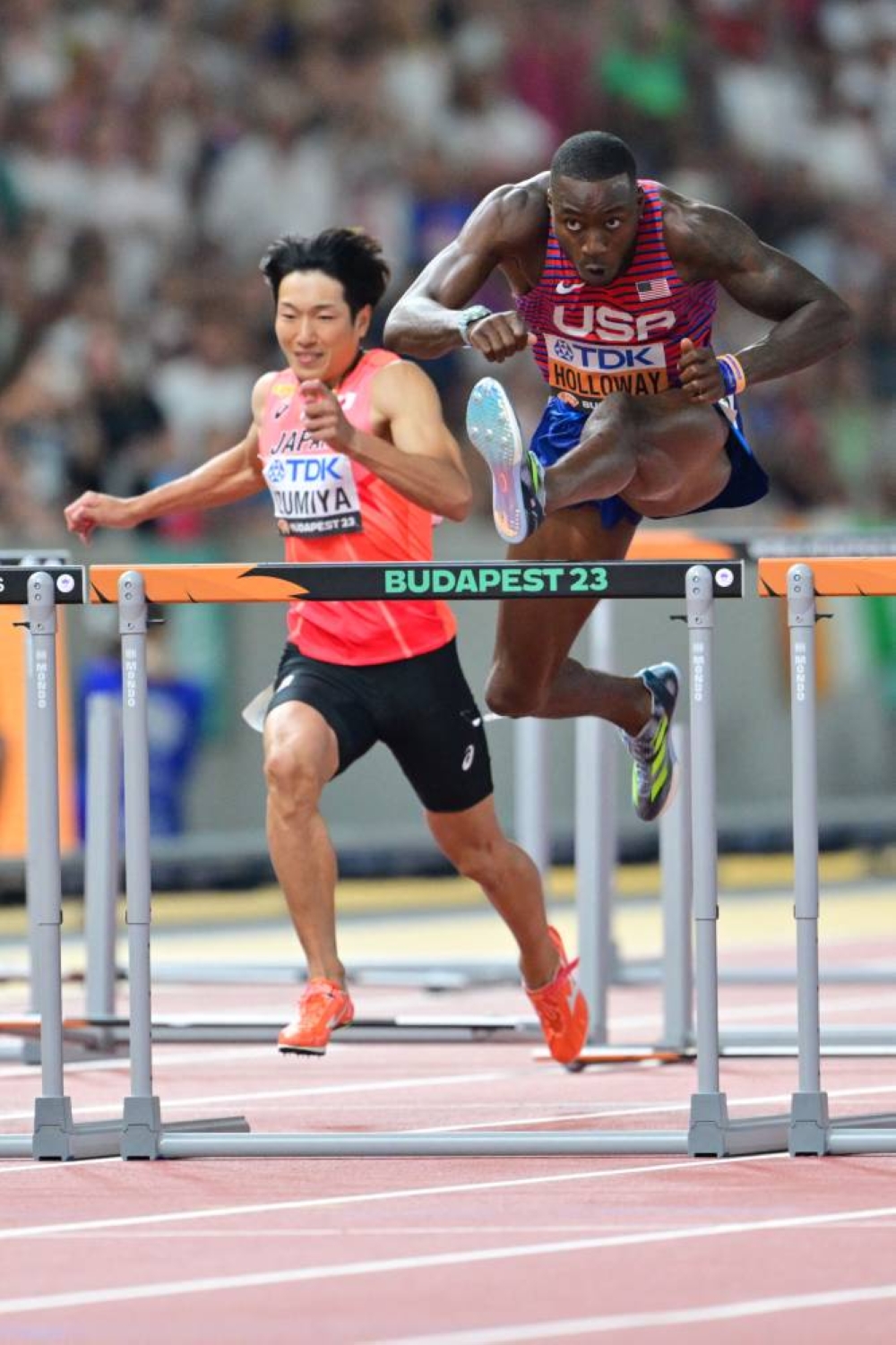 
USA’s Grant Holloway en route to winning the 110m hurdles final. (AFP) 