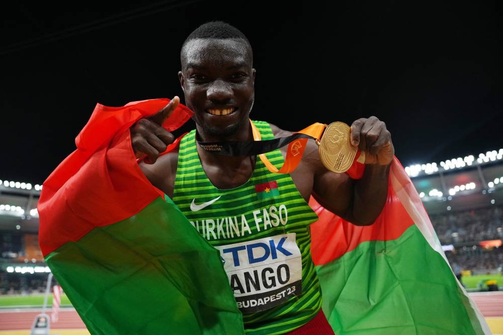
Burkina Faso’s Hugues Fabrice Zango celebrates after winning the men’s triple jump gold. (Reuters) 