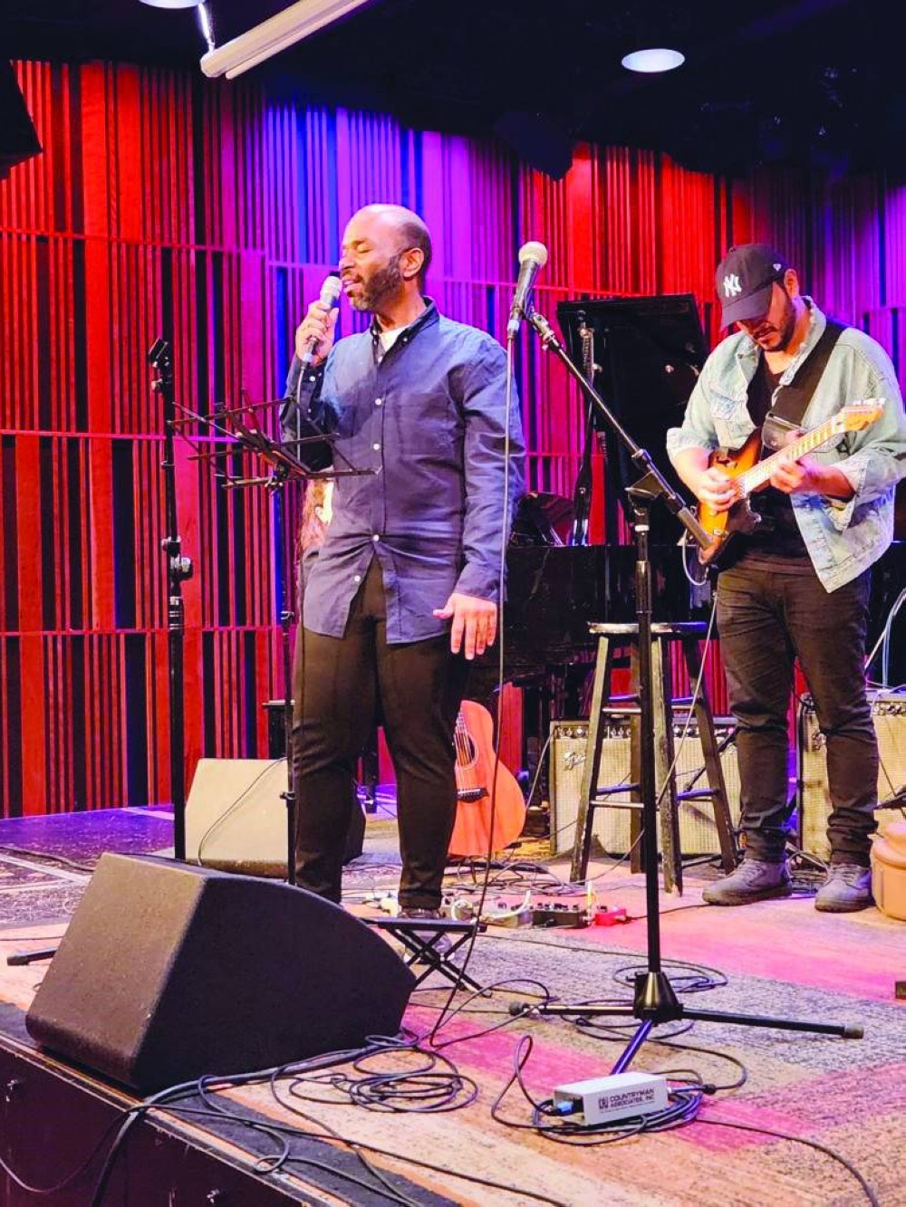 Dr Nasser Sahim al-Jassim on stage in the US.