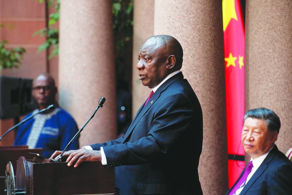 
South Africa’s President Cyril Ramaphosa speaks, as China’s President Xi Jinping listens, at the Union Buildings ahead of the opening remarks of the Brics emerging economies meeting, in Pretoria. 