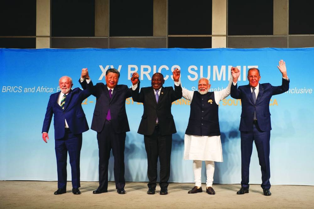 
 (From left) Brazil’s President Luiz Inacio Lula da Silva, China’s President Xi Jinping, South African President Cyril Ramaphosa, Indian Prime Minister Narendra Modi and Russia’s Foreign Minister Sergei Lavrov pose for a picture at the Brics Summit in Johannesburg, South Africa, yesterday (Reuters) 