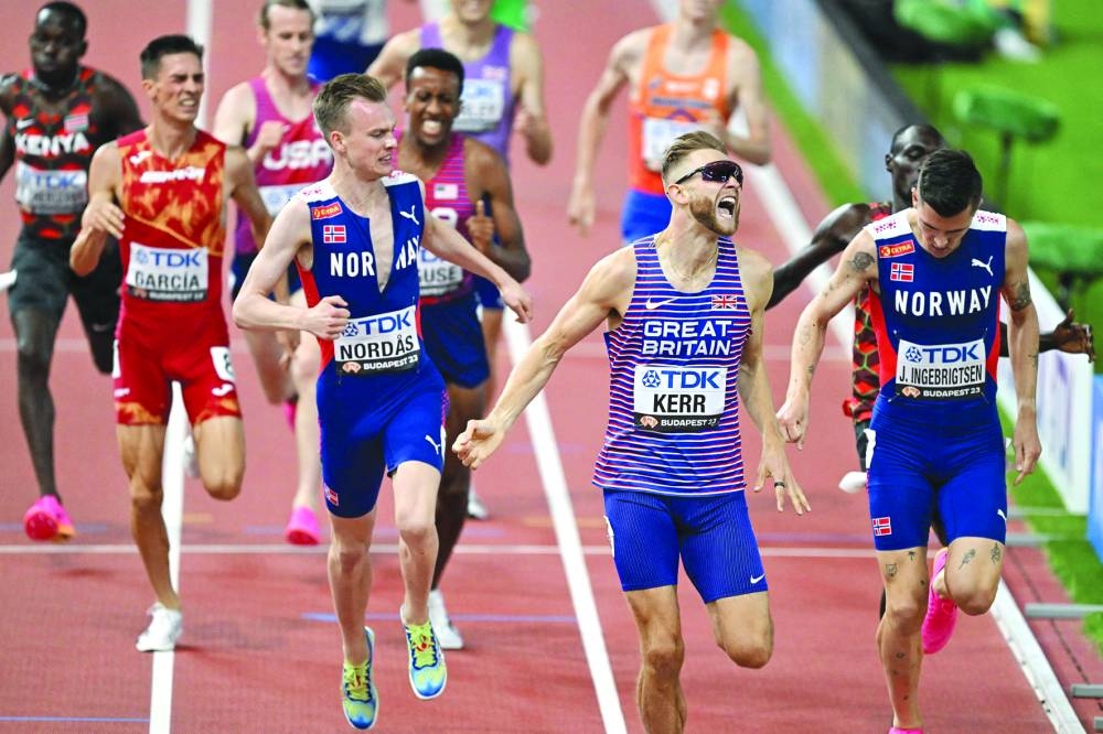 
Britain’s Josh Kerr (centre) celebrates after winning the men’s 1,500m final. (AFP) 
