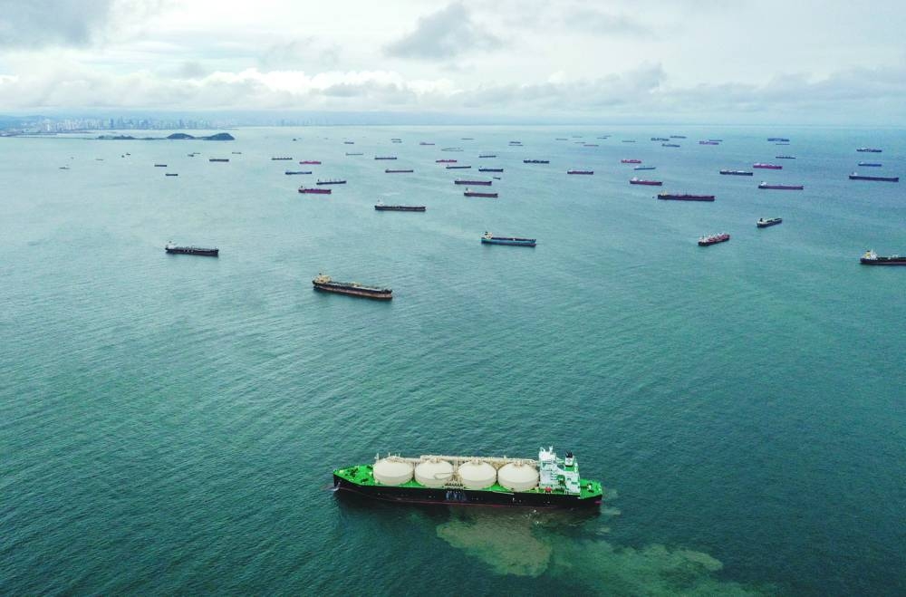 
Aerial view of cargo ships waiting at the entrance of the Panama Canal at Panama Bay off Panama City. 