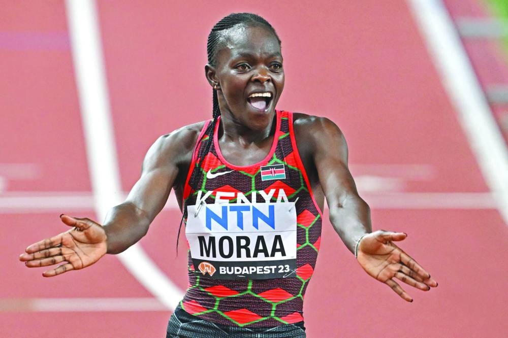 Kenya’s Mary Moraa celebrates after winning the women’s 800m final on Sunday. (AFP)