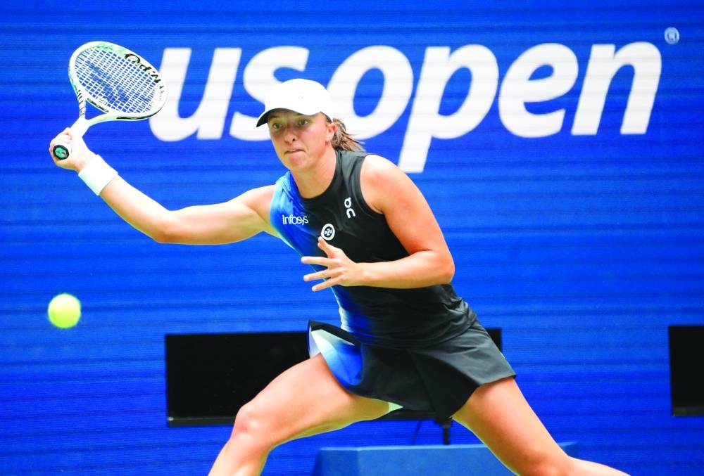 
Poland’s Iga Swiatek hits a forehand during her US Open first-round match against Sweden’s Rebecca Peterson in New York. (USA TODAY Sports) 
