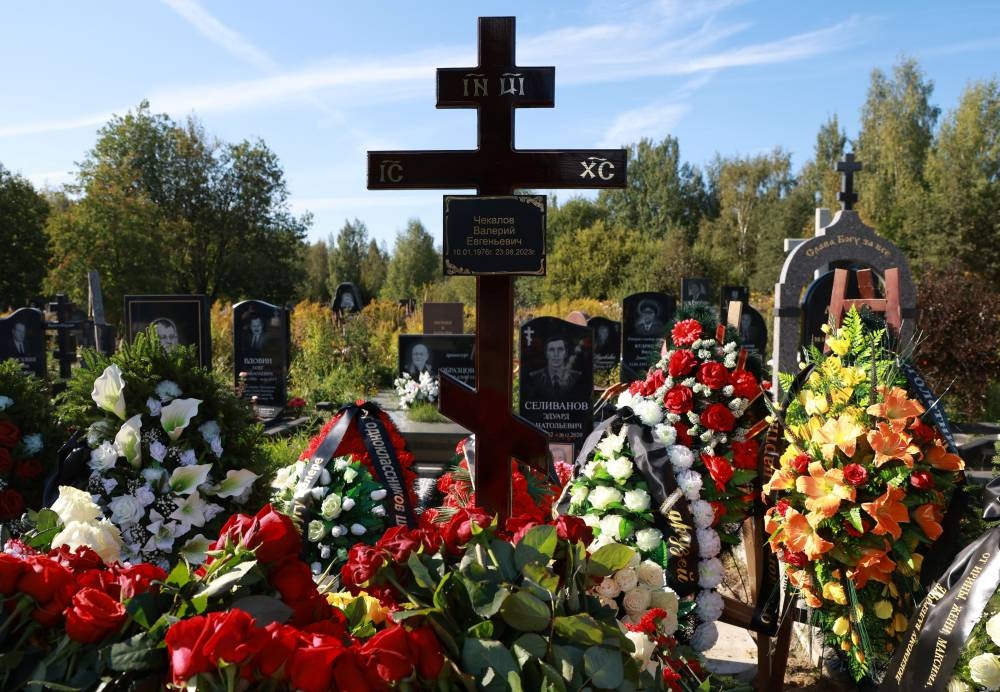 A view shows the grave of Valery Chekalov, logistics chief of the Wagner private mercenary group, after his funeral at the Severnoye cemetery in Saint Petersburg, Russia. REUTERS