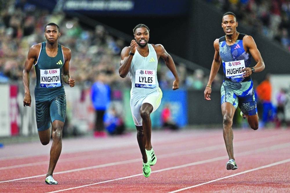 
Noah Lyles (centre) of the US storms to 200m victory in Zurich. (AFP) 