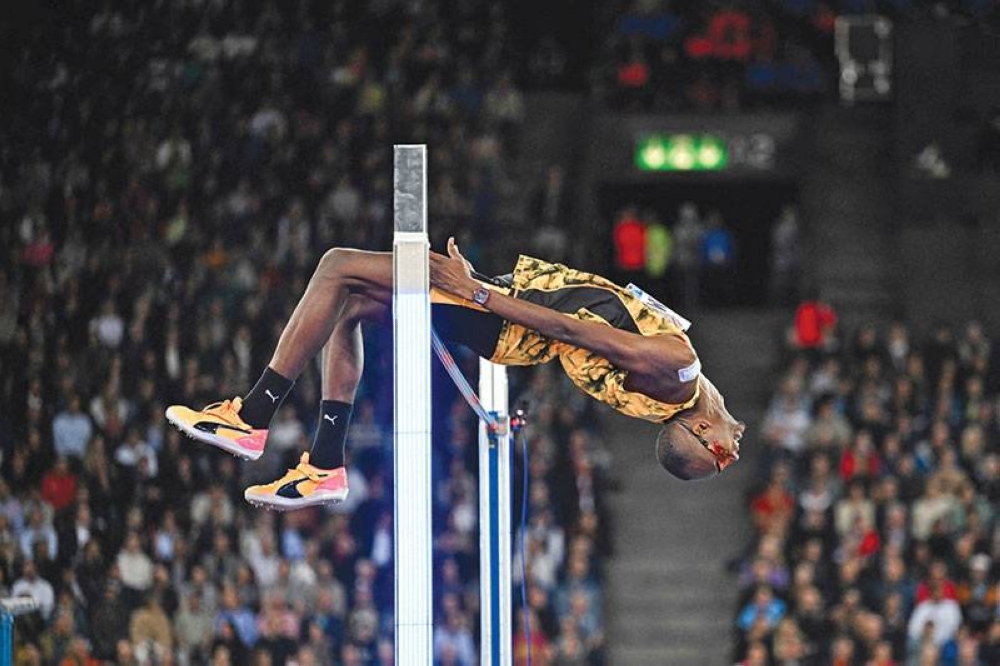 Qatar's Mutaz Barshim in action during the high jump event at the Zurich Diamond League meeting at Stadion Letzigrund stadium on Thursday. (AFP)