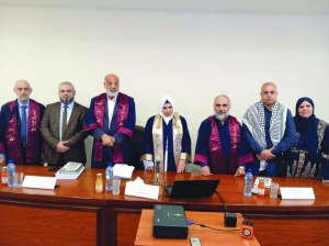 Qatar Charity honours visually impaired Palestinian woman for earning doctorate - Vimarsana News