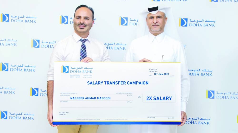 Nasseer Ahmad Masoodi receiving the ceremonial cheque.