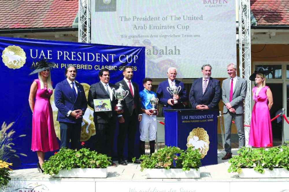 Connections of Wathnan Racing’s Jabalah pose with the trophy after the seven-year-old bay won UAE President Cup at Baden-Baden, Germany, on Sunday. Pictures: Marc Ruehl