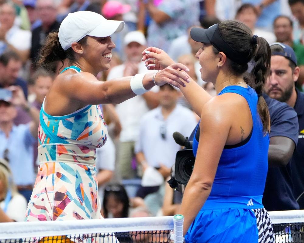 
USA’s Madison Keys (left) embraces compatriot Jessica Pegula after her victory. 