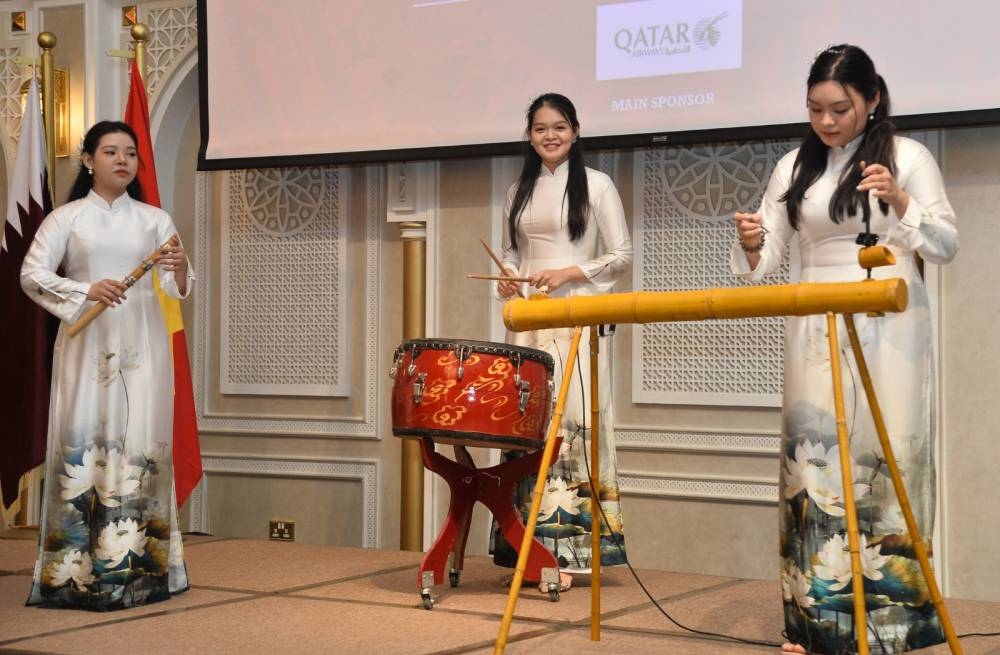 Vietnamese artists perform on the occasion.