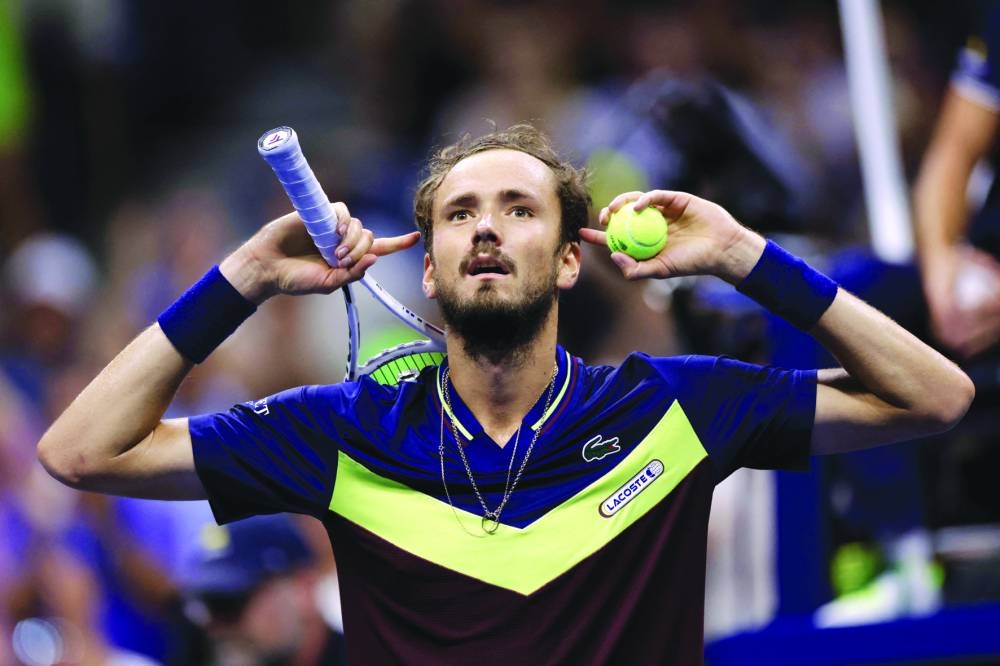 TOPSHOT - Russia's Daniil Medvedev reacts after winning the US Open tennis tournament men's singles semi-finals match against Spain's Carlos Alcaraz at the USTA Billie Jean King National Tennis Center in New York City, on September 8, 2023. (Photo by kena betancur / AFP)