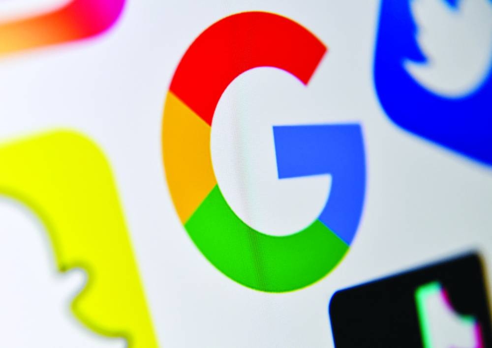 (FILES) A photo taken on October 21, 2020 shows the logo of the multinational American Internet technology and services company, Google (center), the American online social media and social networking service and other social media platforms in Lille. Google begins a marathon battle in a federal court on September 12, 2023 to fight accusations from the US government that it acted unlawfully to become the world's preeminent search engine. (Photo by DENIS CHARLET / AFP)