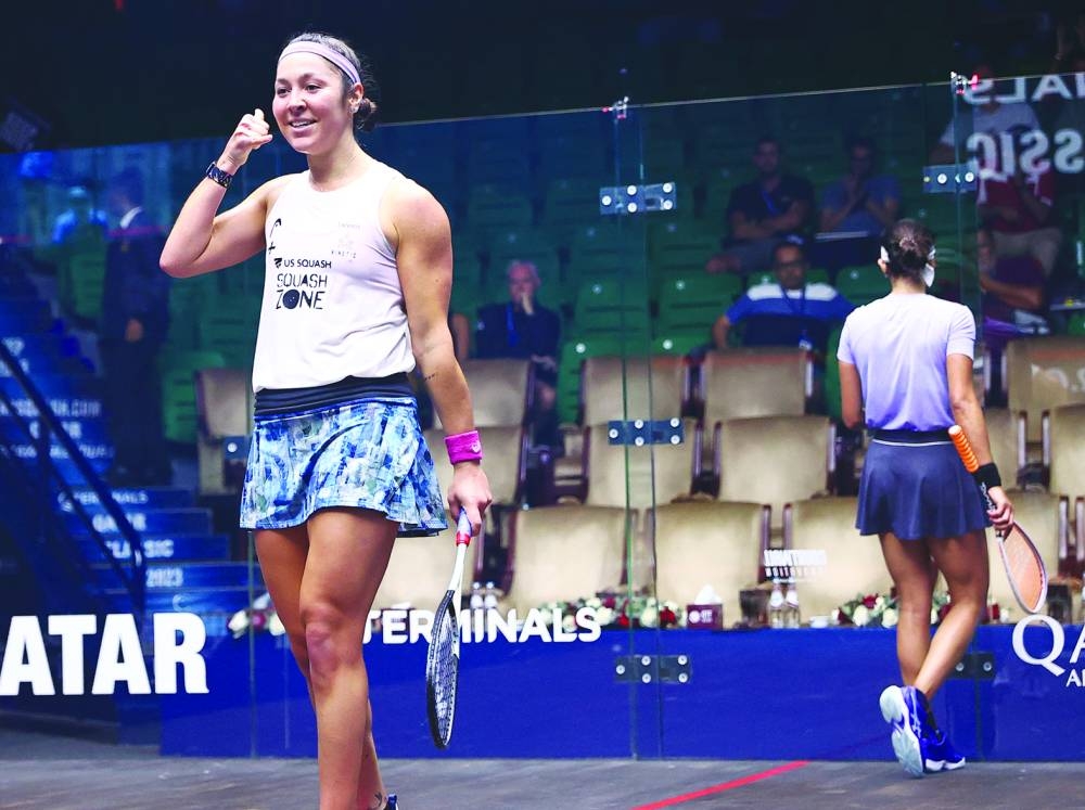 Seventh seed Amanda Sobhy of the US celebrates beating top seed Nouran Gohar of Egypt at the QTerminals Qatar Classic squash tournament at the Khalifa International Tennis and Squash Complex in Doha on Wednesday. Hania El Hammamy of Egypt in action against Gina Kennedy of England.