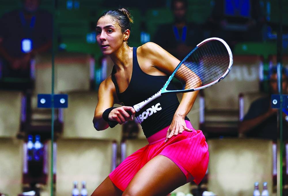 Hania El Hammamy of Egypt in action against Gina Kennedy of England. 