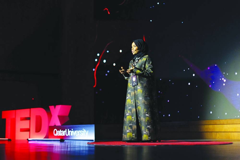 A speaker at TEDxQatarUniversity.