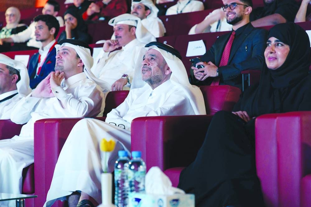 QU president Dr Omar al-Ansari and other officials at the event.