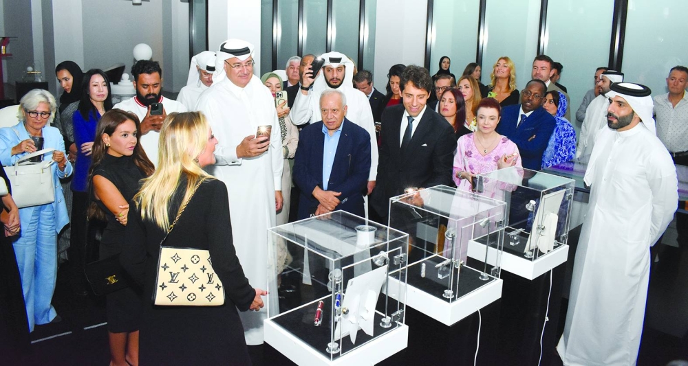 Attendees touring the exhibition at M7.