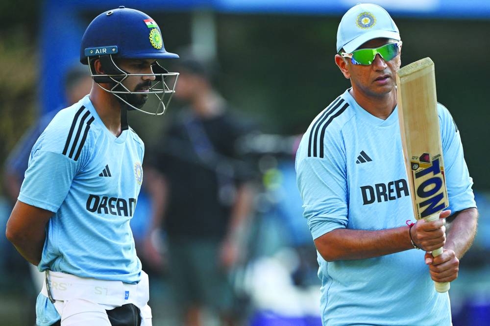 
India’s coach Rahul Dravid (right) talks with Ruturaj Gaikwad during a practice session in Mohali. (Reuters) 
